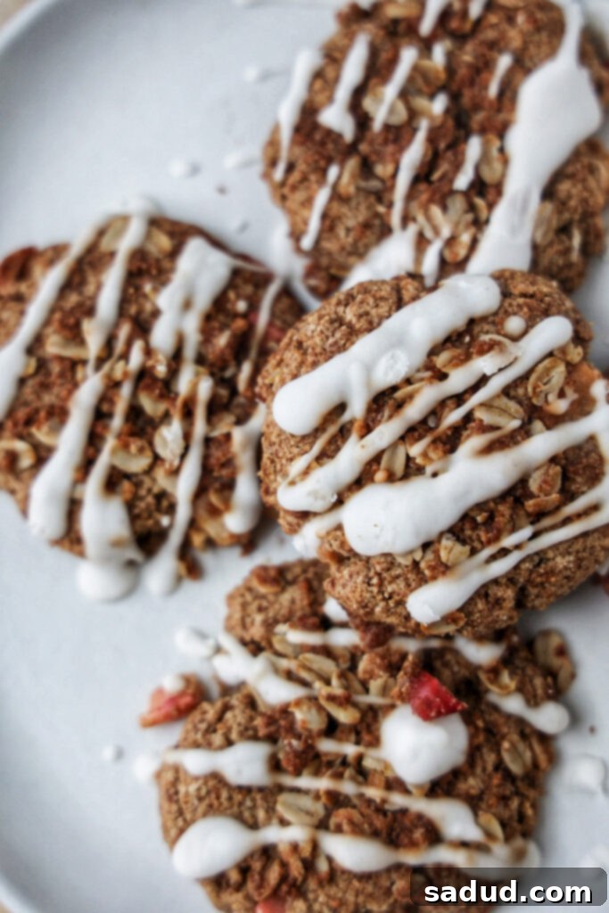 A plate of apple crisp cookies with glaze, showcasing their crisp topping and soft interior.