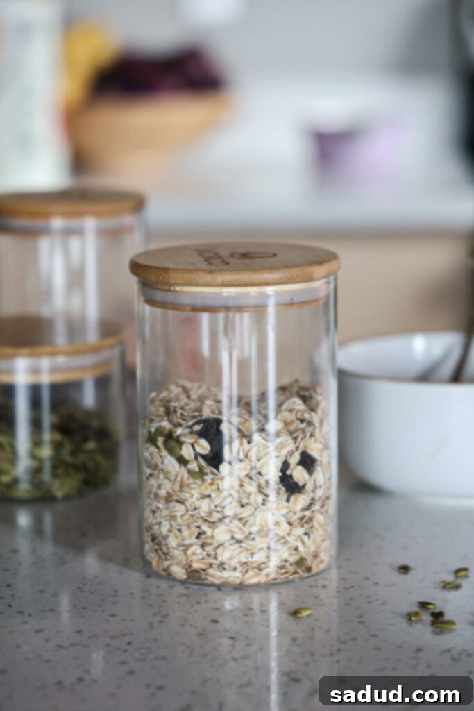 DIY instant oatmeal in a jar with a scoop, showcasing its convenience for breakfast.