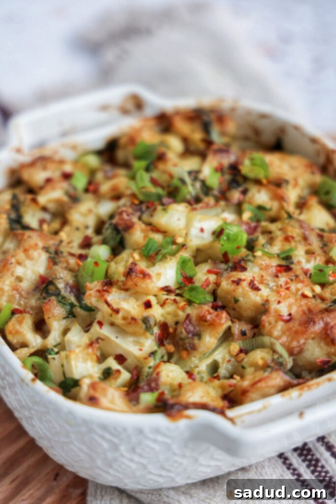 Loaded cauliflower bake - a creamy, cheesy casserole with fresh herbs