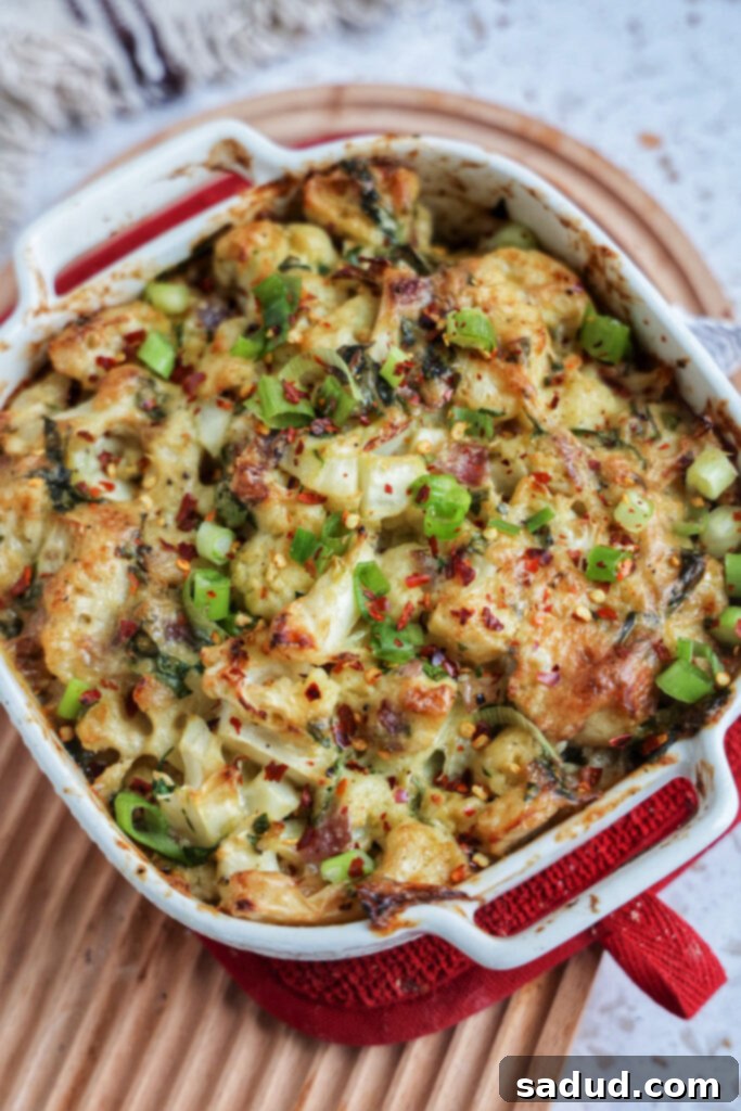 A pan of loaded cauliflower ready for baking