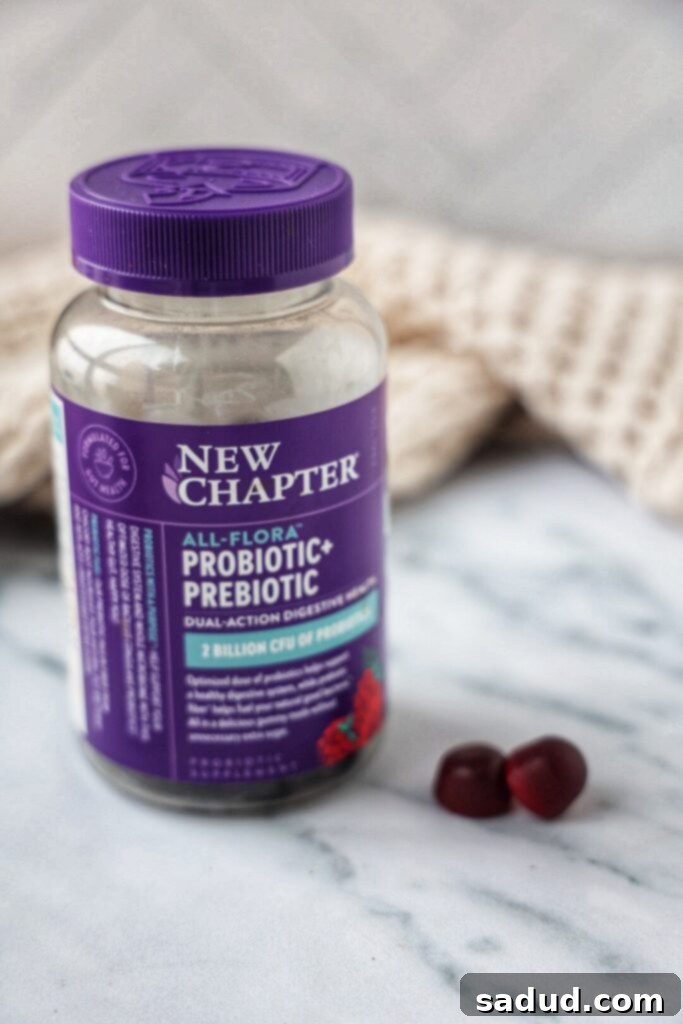 A container of new chapter all-flora probiotic + prebiotic.