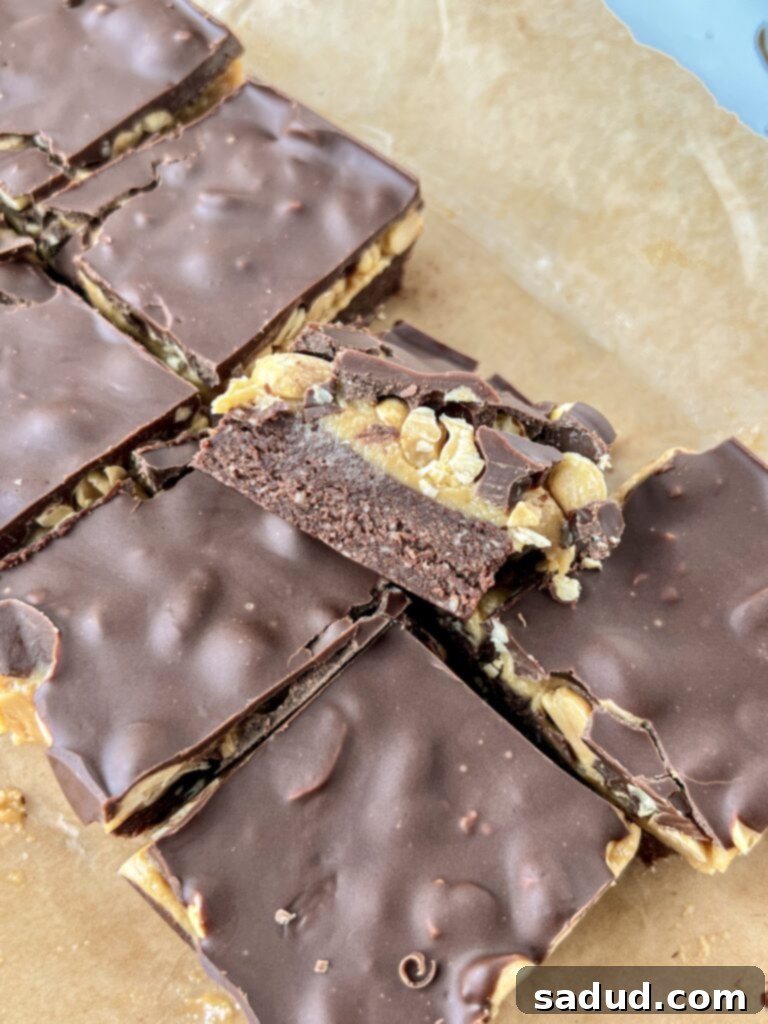 No-Bake Vegan Snickers Protein Brownies 4 A tray full of freshly made Snickers protein brownies, ready for freezing.