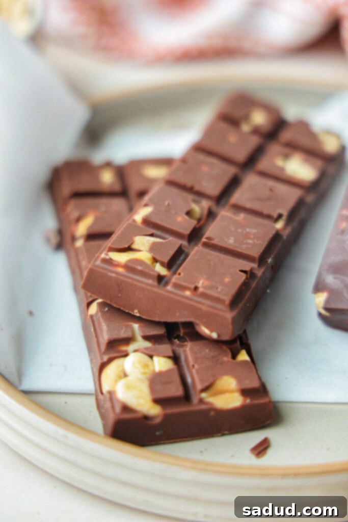A plate of healthier homemade Mr. Goodbar candy bars, showcasing their delicious texture and inviting appearance.