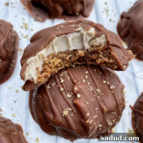 A close-up of a delicious banana caramel cookie, perfectly coated in chocolate and ready for a bite.