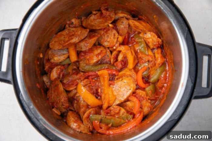 Instant Pot sausage and peppers after pressure cooking, stirred and ready to be served.