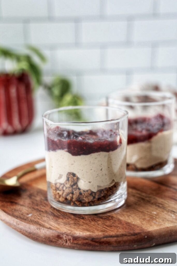Easy to make vegan protein cheesecake jars, a healthy, high protein, gluten-free, and refined sugar-free treat.