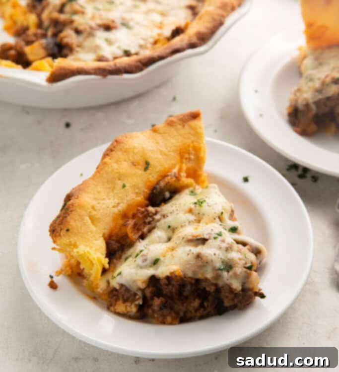 A beautifully baked Keto Meat Pie, showcasing its golden crust and delicious filling, ready to be served.