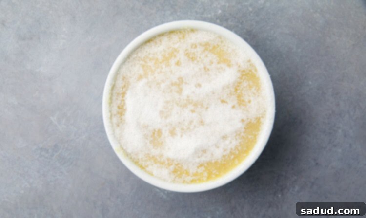 Liquid vegan creme brulee mixture poured into a small ramekin