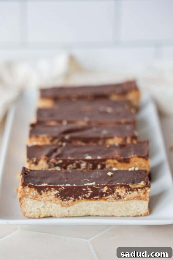 Coconut Caramel Chocolate Bars 4 A plate of coconut cookie bars (twix style).