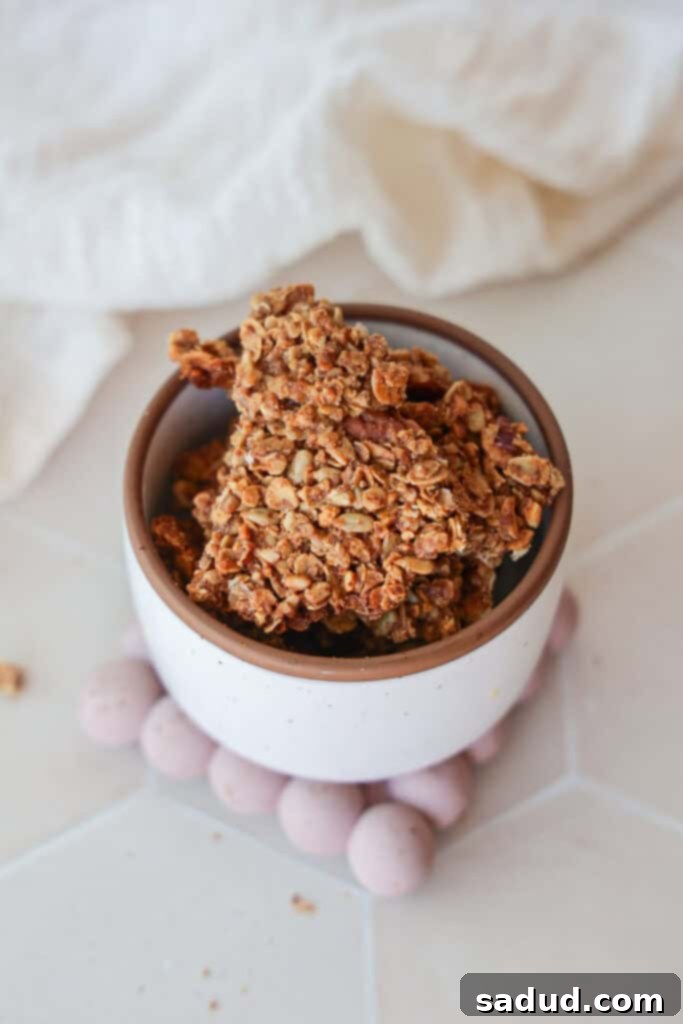 Crunchy granola clusters stored in a jar, ready for snacking or topping.
