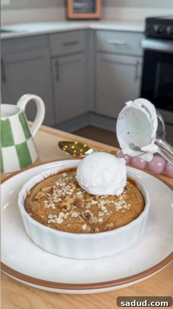 Step-by-step image 3: Baked protein oats in a ramekin, fresh from the oven, ready for toppings.