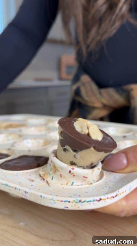 Step-by-step image of topping yogurt bites with melted chocolate and peanuts before freezing.