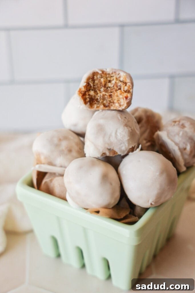 A stack of healthy vegan donut holes, perfectly glazed and ready to be served as a delightful treat.