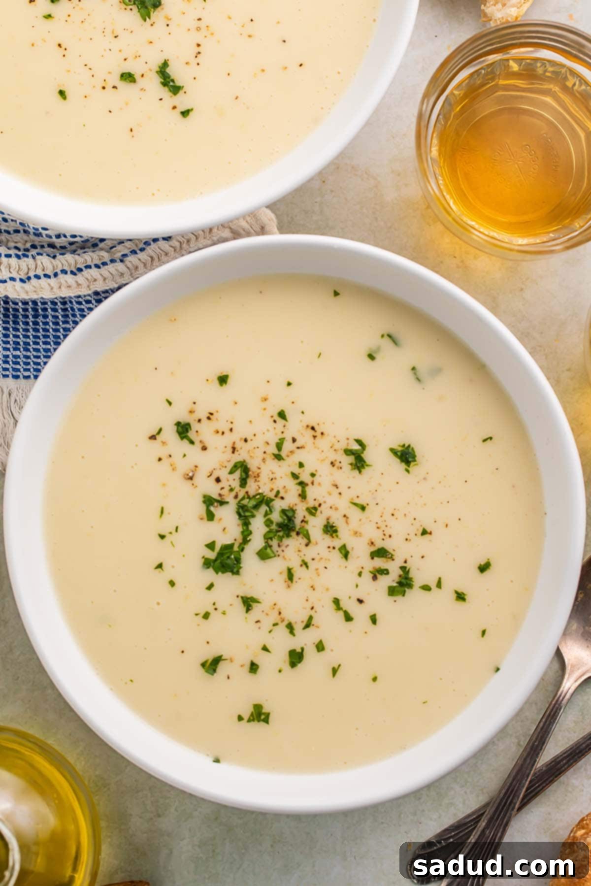 Close-up of a bowl of Irish potato soup on a table.