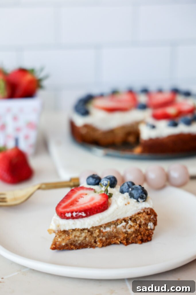 Sugar cookie pizza with frosting and fruit/berries.
