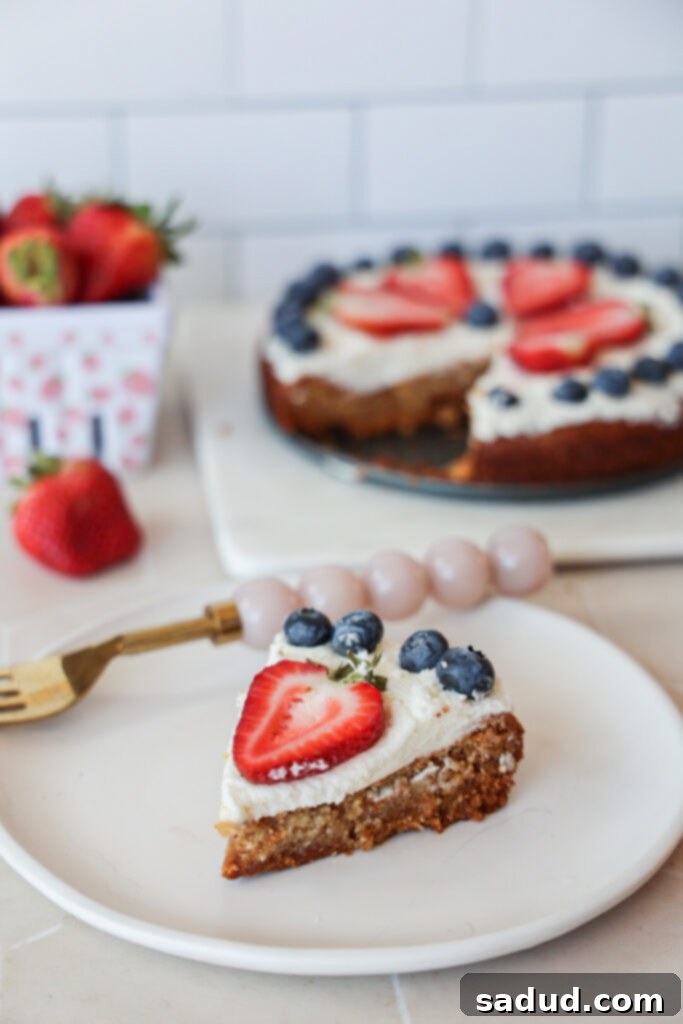 Sugar cookie pizza with frosting and fruit/berries.