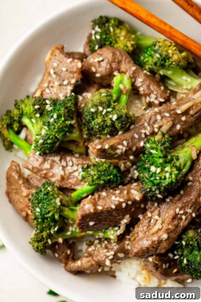Close-up of Beef with Garlic Sauce and broccoli in a pan.