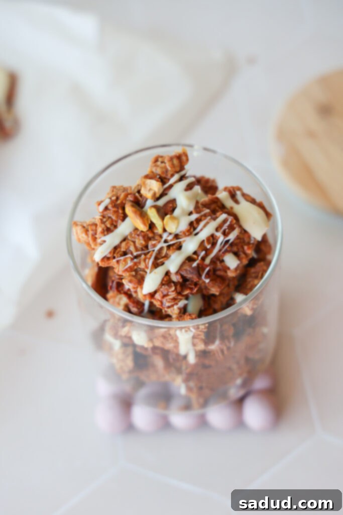 Baklava Granola Clusters 3 A jar of crunchy granola clusters, perfect for a healthy snack or breakfast.