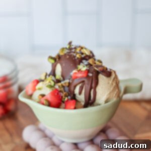 Ninja Creami Vegan Pistachio Perfection 4 A scoop of homemade vegan pistachio ice cream.
