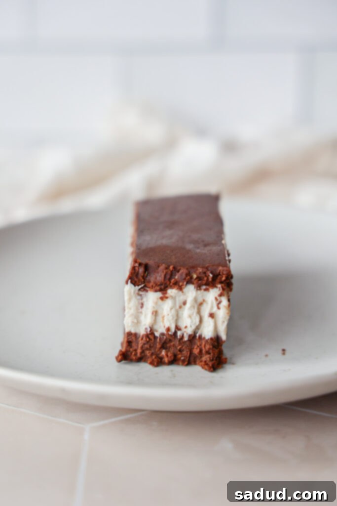 Crafting Delicious Dairy-Free Gluten-Free Ice Cream Sandwiches 4 Delicious dairy-free, gluten-free homemade ice cream sandwiches on a rustic wooden board.