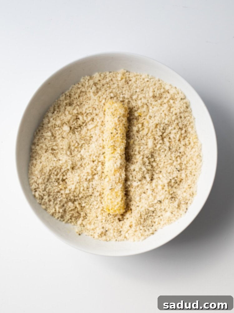 Mozzarella stick coated in gluten-free panko breadcrumbs