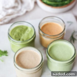 A vibrant collage of four distinct homemade healthy salad dressings, including peanut butter dressing, herby tahini sauce, cilantro lime dressing, and sweet and spicy tahini.