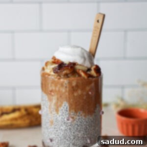 A beautifully presented serving of Banana Chia Pudding in a jar.