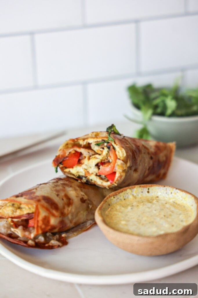 Healthy breakfast burrito with a homemade potato wrap, showcasing its golden-brown texture and delicious filling.
