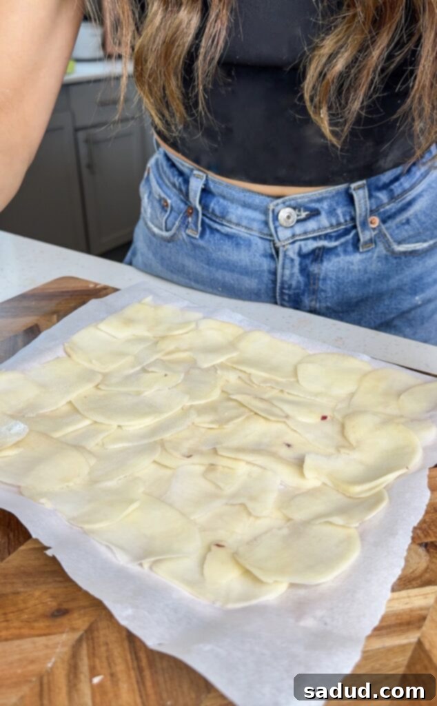 Thinly sliced potatoes laid out for a healthy gluten-free wrap.