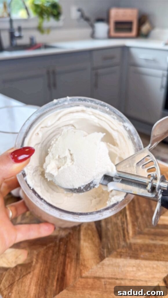 Protein Rich Vegan Affogato Homemade 3 Homemade protein ice cream being churned in a Ninja Creami machine, showing its creamy texture.