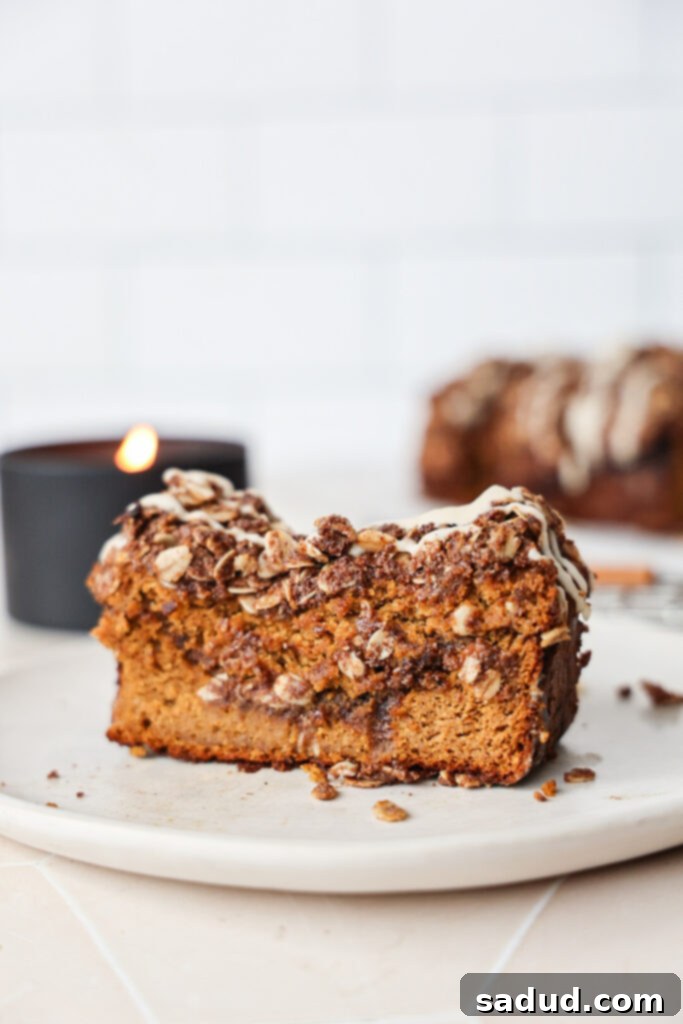 Spiced Gluten Free Dairy Free Pumpkin Streusel Bread 3 A slice of pumpkin bread with streusel topping (gluten-free, dairy-free).