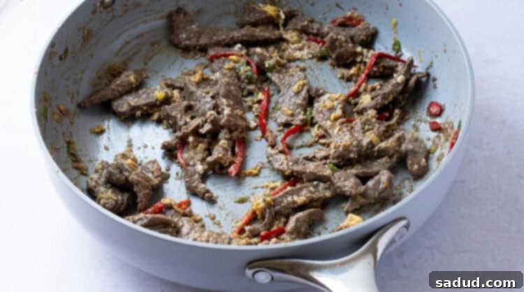 Beef and scrambled egg in large skillet
