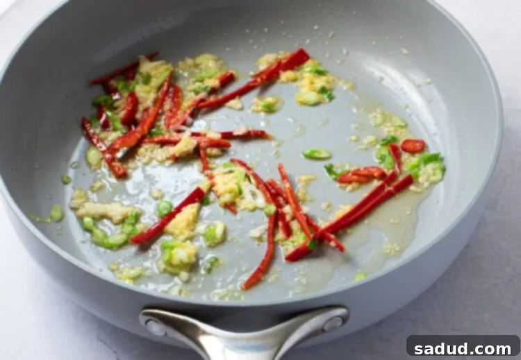 Garlic and red chilis in a skillet