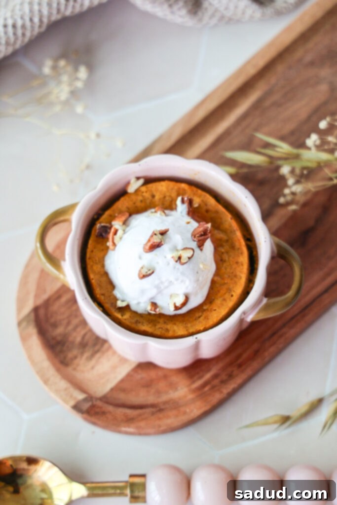 15 Nourishing Pumpkin Dishes 9 Healthy pumpkin recipes - single serve pumpkin pie in a small ramekin with whipped topping.