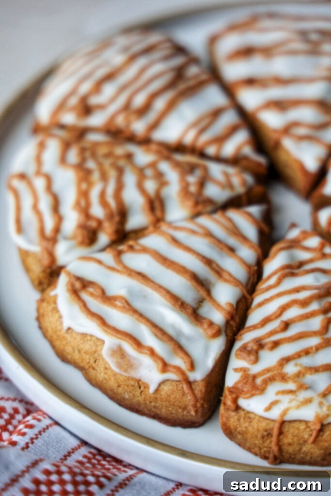 Gluten-Free Harvest Pumpkin Scones 3 close up of gluten-free pumpkin scones with maple glaze