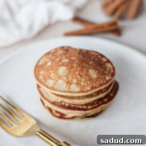 Ultimate Gluten-Free Protein Pancakes Vegan Friendly 4 Stacked protein pancakes with fruit