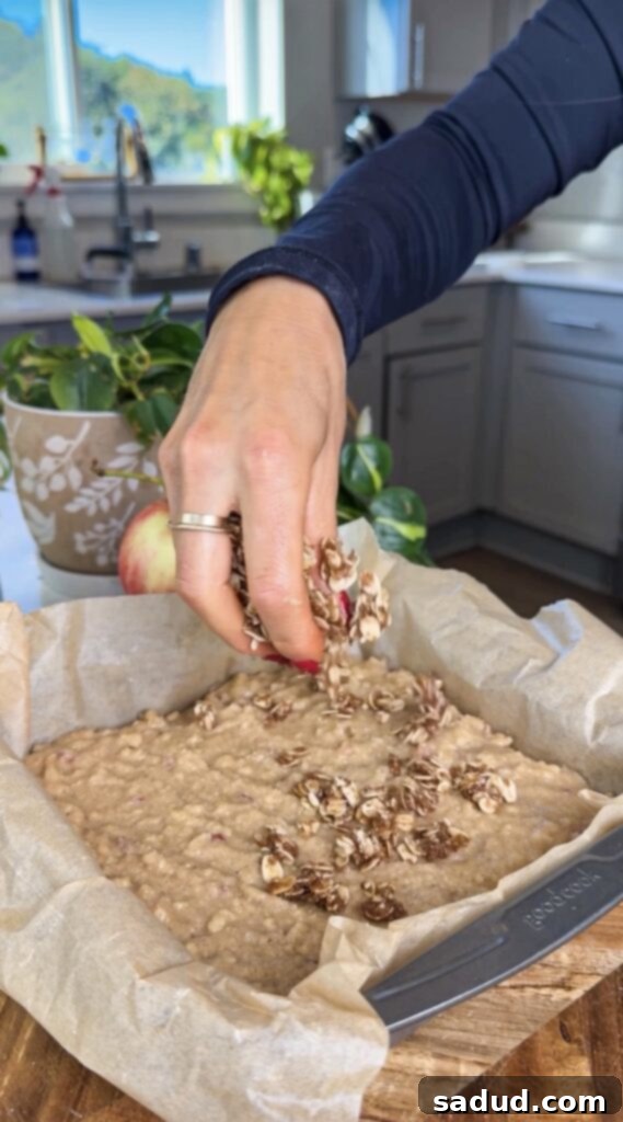 Gluten-free apple cake with crumble on a serving board