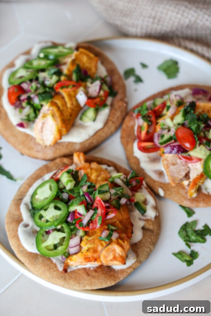 Whip Up Naan Tacos 3 Naan tacos on a wooden board