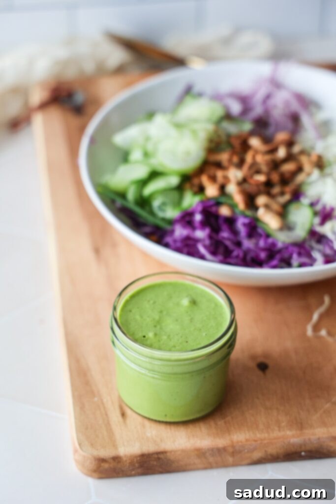 Vibrant Vegan Green Goddess Dressing 2 A green goddess salad with cashews and green goddess dressing.
