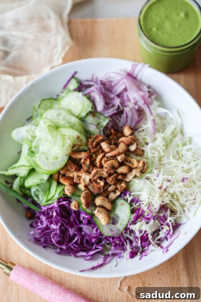 Vibrant Vegan Green Goddess Dressing 4 A green goddess salad with cashews and green goddess dressing.