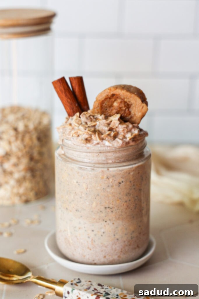 Cinnamon roll overnight oats ready in a jar for a delicious breakfast.