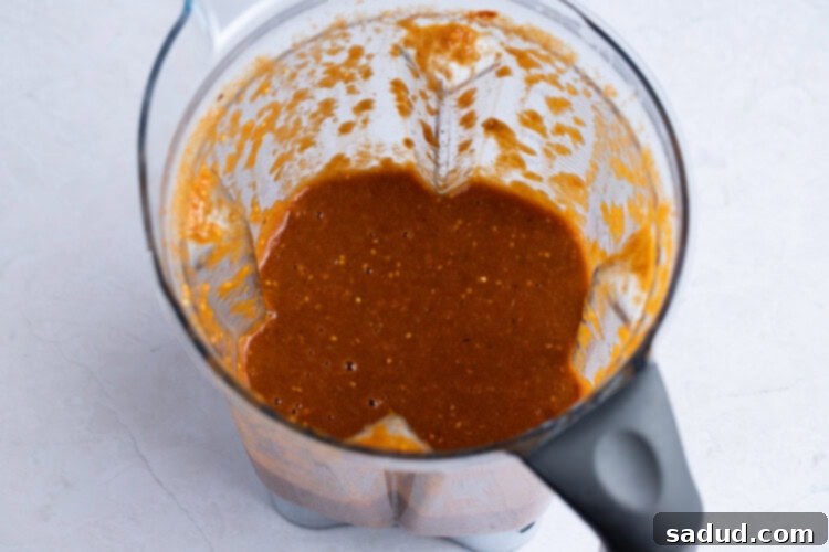 Tomatillo red chili salsa in a blender
