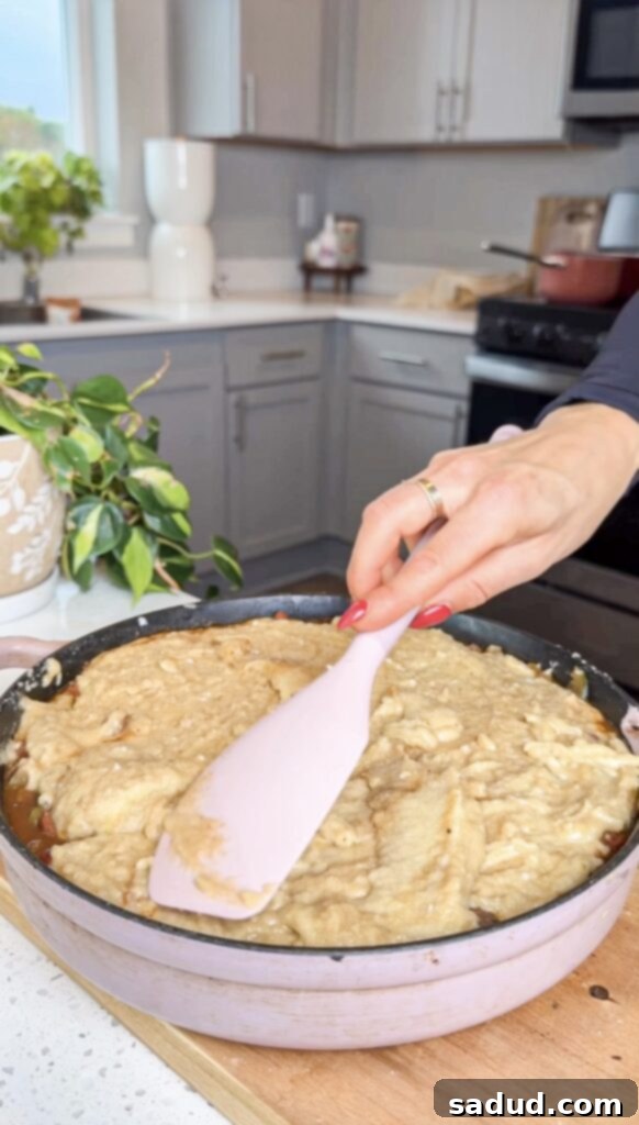 Detailed step-by-step image of how to assemble cornbread chili casserole.