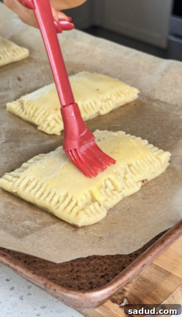 Step-by-step assembly of homemade pop tarts with filling.