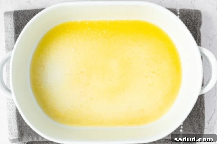 Melted vegan butter in a baking dish