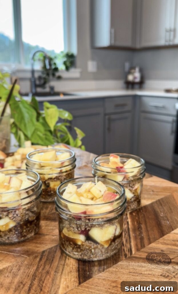 Apple Crisps in Jars 3 Ingredients for individual apple crisps, including apples, oats, pecans, and coconut sugar