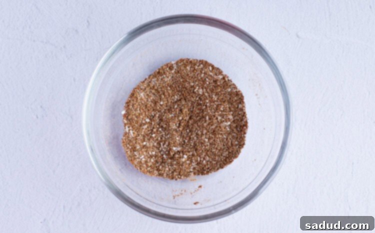 Dry rub spice mixture in a large glass bowl